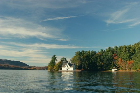 Rural mental health in countryside community with lake and trees