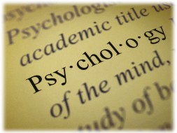 Psychology dictionary definition text with meaning printed on paper